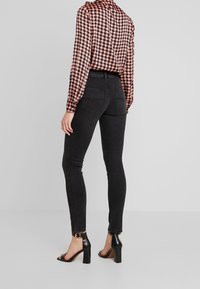 Diesel Vaqueros pitillo - grey denim