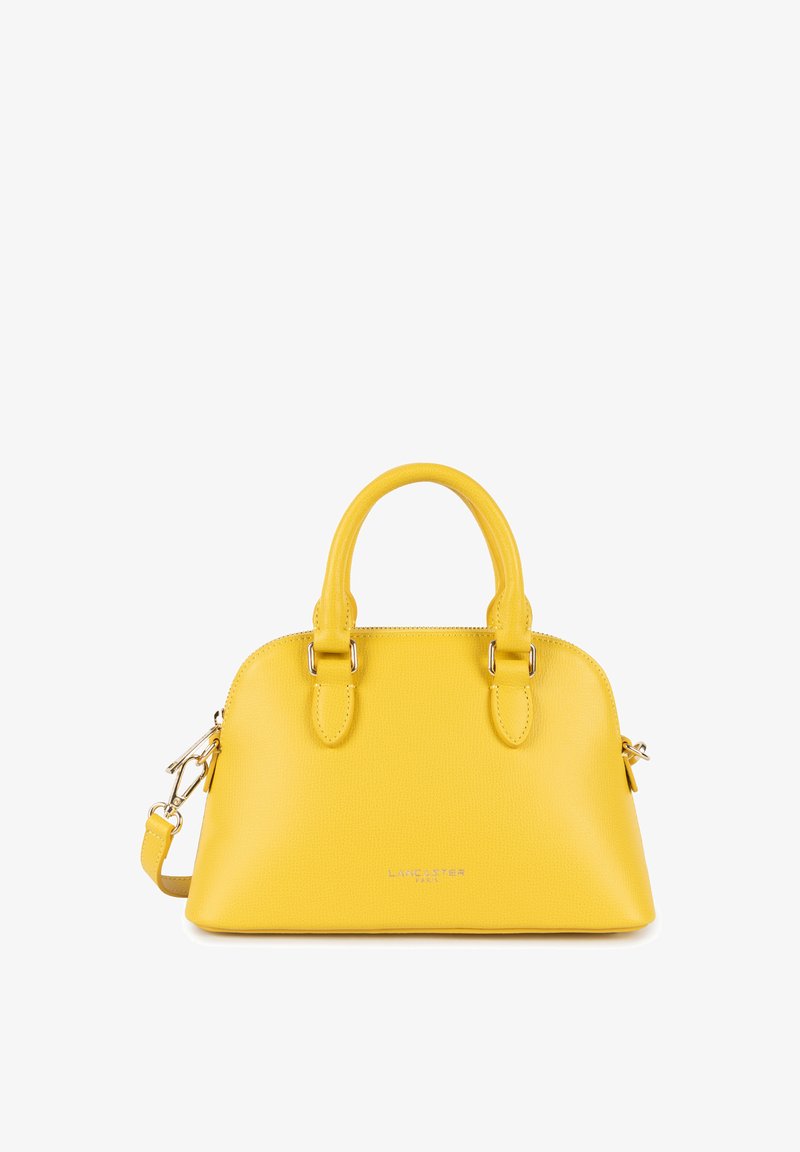Borsa a mano gialla in pelle con una forma strutturata, doppi manici superiori, tracolla removibile e dettagli metallici.