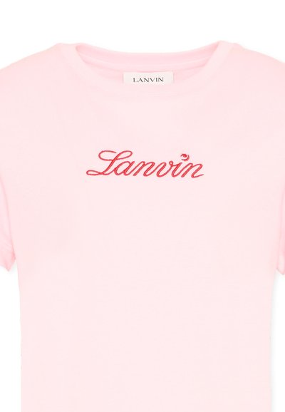 Light pink short-sleeve shirt with red cursive "Lanvin" embroidery centered below the neckline and a Lanvin label inside the collar.