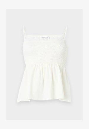 Hvit ermeløs topp med smokkert overdel, tynne stropper og peplumkant, designet for en avslappet passform.