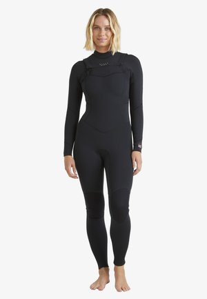 Black neoprene wetsuit with long sleeves, a high neck, paneling, and textured knee pads. Designed for aquatic activities, fitted silhouette.