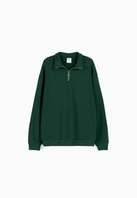 Dark green long-sleeve pullover with a half-zip collar and silver ring zipper, ribbed cuffs, and hem.