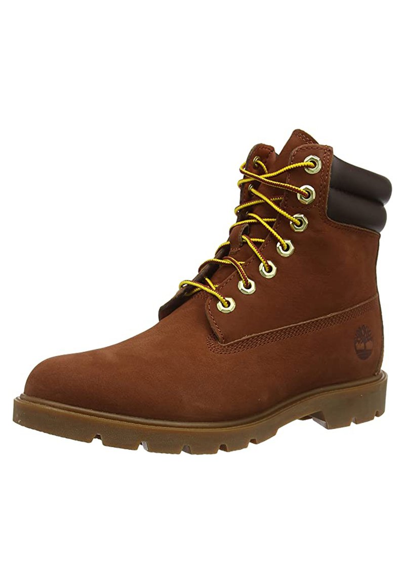 Braune Leder Schnürstiefel mit gepolstertem Kragen, gelben Schnürsenkeln, Metallösen und Gummisohle mit strukturiertem Profil.