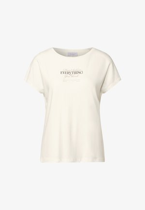 Cremefarvet T-shirt, rund halsudskæring, korte ærmer, med trykt tekst i mørkegrå. Blødt stof med en afslappet pasform.