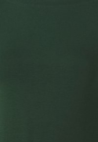Dark green, soft cotton fabric with a smooth texture, featuring a solid, unadorned surface and a fitted design.