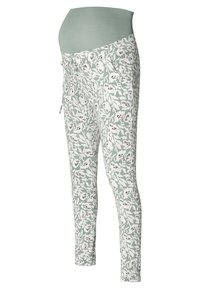 Spodnie ciążowe z miękkim, zielonym pasem brzusznym, ozdobione kwiatowym wzorem w białym i czarnym kolorze na jasnoszarym tle. Wąski krój.
