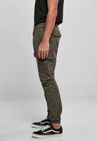 Urban Classics AOP GLENCHECK CARGO JOG PANTS - Cargobyxor - olive