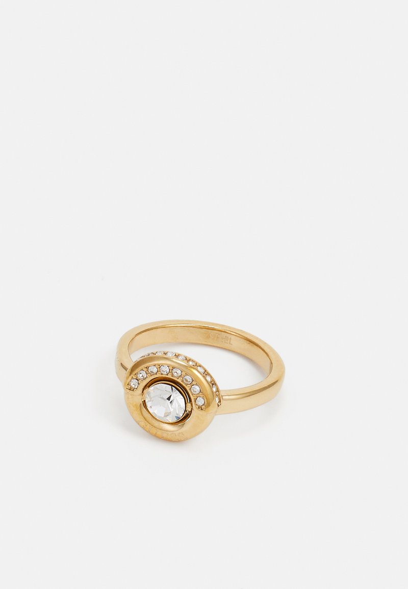 Gold metal ring featuring a circular design, centered with a clear stone and accented by a row of small clear stones around it.