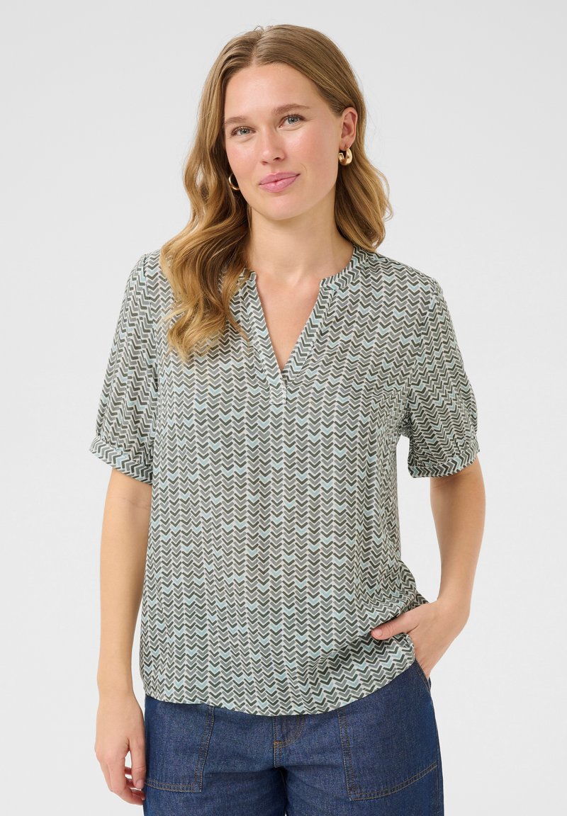 Korte mouwen blouse in een groen-wit zigzagpatroon, met een V-halslijn en lichtgewicht stof, met opgebouwde manchetten en een losse pasvorm.