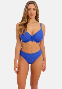 Blue bikini set featuring a textured fabric, molded cups with a center twist detail, and a high-waisted bottom. Adjustable straps included.