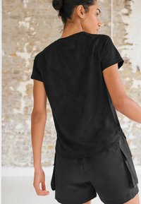 Next T-Shirt print - black
