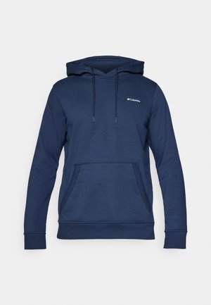 Sweatshirt à capuche bleu marine en tissu doux. Présente une poche kangourou sur le devant et des cordons au niveau de la capuche. Logo de la marque sur la poitrine.