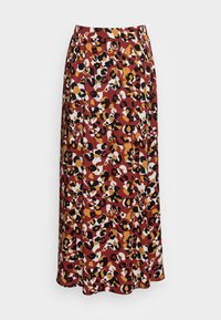 Maxikjol i en vinröd botten med ett färgglatt leopardmönster i svart, vitt och gult. Tillverkad av ett lätt, slätt textil.