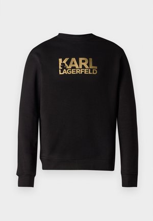 Sweatshirt preto de manga longa com texto em dourado "KARL LAGERFELD" e logotipo de silhueta centralizado no peito.
