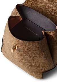 Brown textured leather handbag with black accents, featuring a gold clasp and an open top, showcasing a spacious interior.