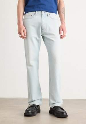 Straight leg jeans - static light