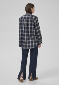 My Essential Wardrobe Blus - after midnight check