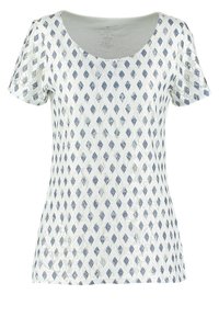 Chemise blanche à manches courtes avec motif losanges bleus et texture alvéolée, encolure dégagée et coupe régulière.