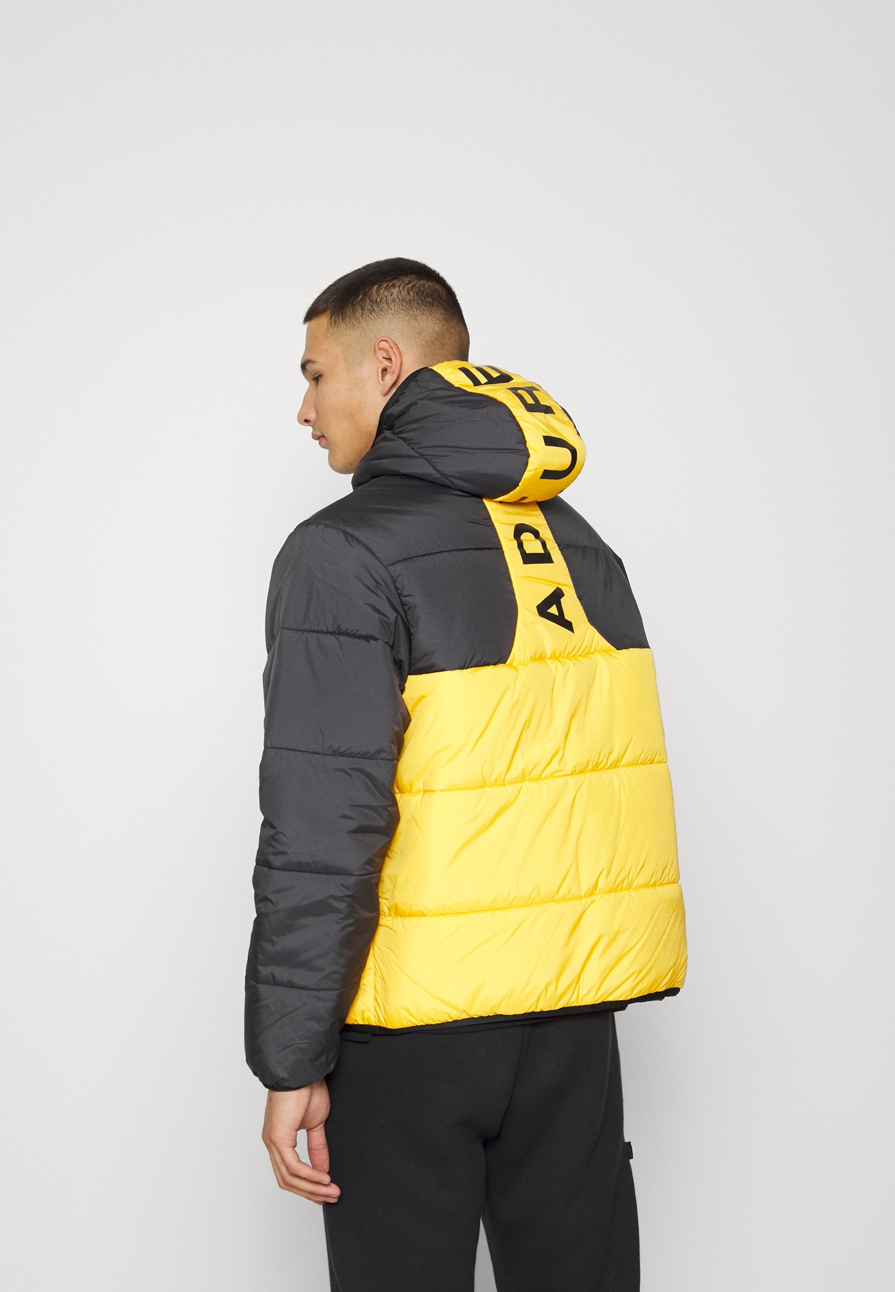 adidas yellow puffer