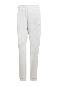 Light gray athletic pants with an elastic waistband, side pockets, and tapered legs. Features a subtle logo on the left hip. Soft texture.