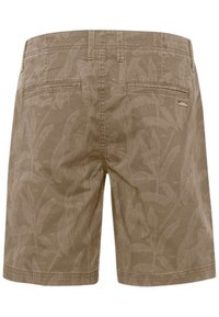 Pantalones cortos caqui con un patrón de hojas, hechos de algodón, que cuentan con dos bolsillos traseros y una textura suave. Detalles de costura visibles.