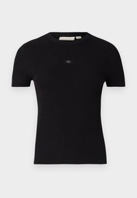 T-shirt nero a maniche corte realizzato in tessuto a coste, con colletto rotondo e un piccolo logo etichetta sul petto.