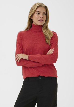 Roter Rollkragenpullover mit langen Ärmeln, geripptem Kragen, weicher Textur und entspannter Passform, kombiniert mit schwarzen Hosen.