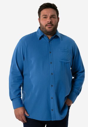 Blauwe button-up shirt van zachte stof, met een borstzak, puntige kraag en zwarte knopen. Lange mouwen met knoopmanchetten.