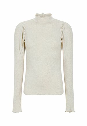 Langærmet tætsiddende sweater i lys beige, med struktureret ribbet stof, sammentrukne skuldre og en bølget kant.