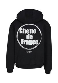 Black hooded sweatshirt featuring a large circular graphic with the text "Ghetto de France" in bold white letters on the back.