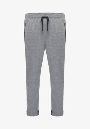 Grå sweatsbukser lavet af blødt materiale, med en elastisk talje med en sort snor, sidelommer og tapered ben.