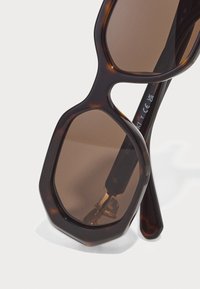 Swarovski Päikeseprillid - dark havana