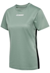 Light green athletic t-shirt in moisture-wicking fabric. Features a round neck, short sleeves, and black side accents. "HUMMEL" logo in white.
