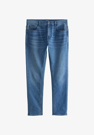 Jean slim bleu avec poches avant, passants de ceinture, fermeture par bouton et motif délavé sur la cuisse.