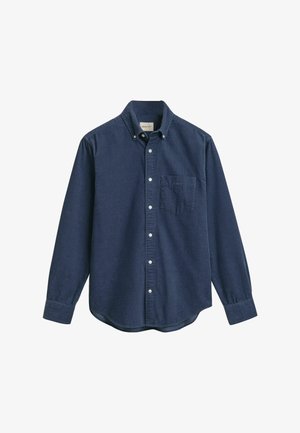 Navyblauwe knoopsluiting blouse van zachte katoen, met een borstzak, lange mouwen en een gebogen zoom. Klassieke kraag met witte knopen.