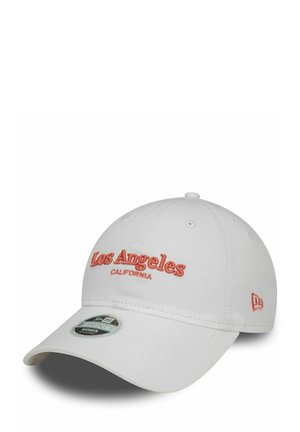 White baseball cap with embroidered "Los Angeles" in coral and "CALIFORNIA" below. Features a curved brim and ventilation eyelets.