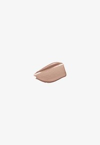 Smooth metallic beige makeup swatch with a slightly curved, brushstroke texture on a white background.