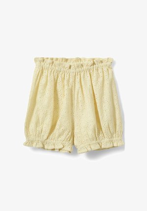 Heledad kreemikas-kollased pitskangast lühikesed püksid, millel on elastne vöökoht ja sätendavate volangidega lõiked, õiekujulise lõikemustriga.