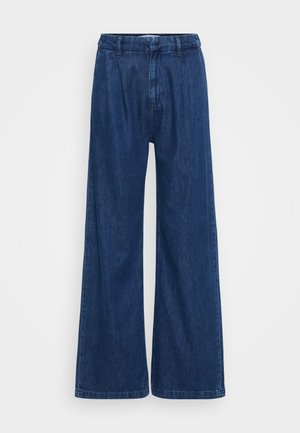 Wide-leg blue denim trousers with a high waistband, visible stitching, and a smooth texture. No external pockets are visible.