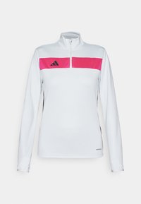 Long-sleeve athletic top featuring a white body, pink chest panel, black side accents, and a zip collar. Made of lightweight, breathable fabric.