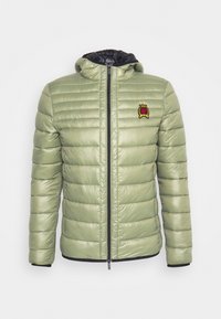 Light green quilted hooded jacket with black zipper and embroidered crest on the left chest, displayed on a plain white background.