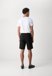 HUGO Pantalon de survêtement - black