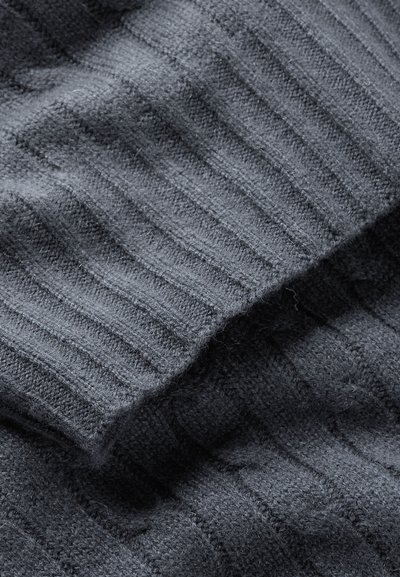 Gray ribbed knit fabric with soft texture, featuring contrasting horizontal and vertical patterns for added depth.