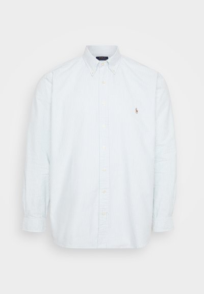 Gaišzila svītraina krekls ar garām piedurknēm, kas piedāvā klasisko apkakli un nelielu izšūtu logotipu uz kreisā krūtīs.