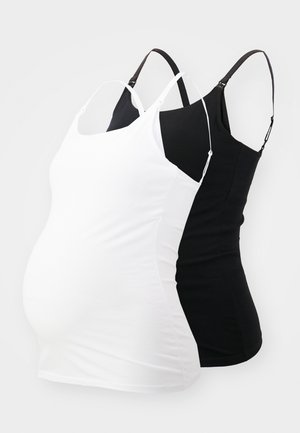 Kaks rasedusöösärki mustas ja valges värvitoonis, millel on reguleeritavad õlapaelad, kujutatud mannekeenidel, millel on raseda kõhu kuju.