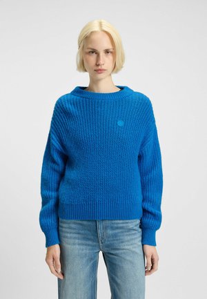 - Sweter