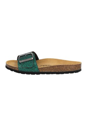 Green and black slip-on sandal with a woven strap, silver buckle, cork footbed, and textured black sole.