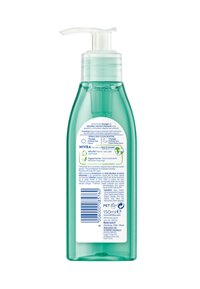 Clear green plastic bottle with a pump dispenser. Features product label on the back, detailing ingredients and instructions. 150 ml capacity.