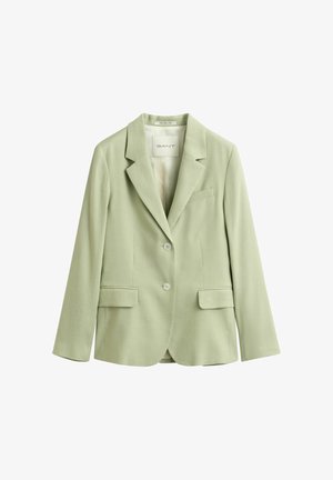 Lichtgroene op maat gemaakte blazer met inkeping revers, twee klepzakken aan de voorkant, borstzak met biezen en een sluiting met twee knopen.