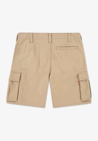 Μπεζ cargo σορτς από βαμβάκι, με δύο πλαϊνές τσέπες, μία πίσω τσέπη και λουριά για ζώνη. Ομαλή υφή με casual σχεδιασμό.